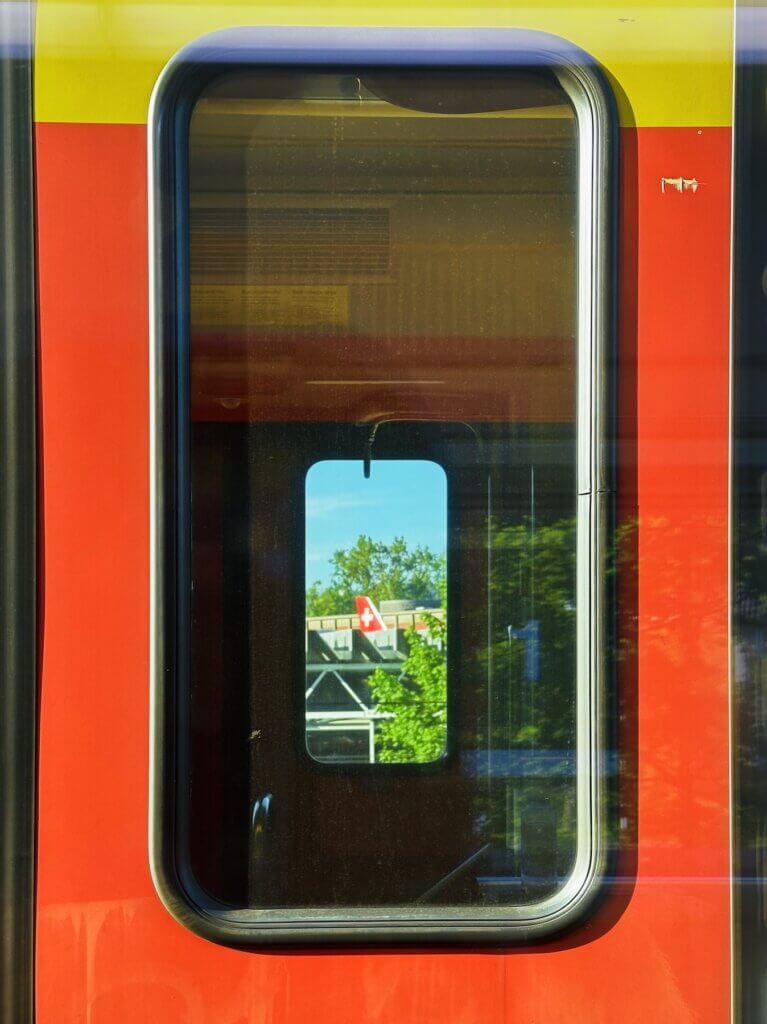 Matthias Maier | Swiss plane through a Swiss train